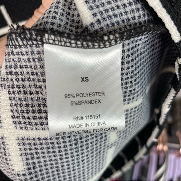 Romeo & Juliet Couture Black and White Cross Dress - Picture 3 of 6